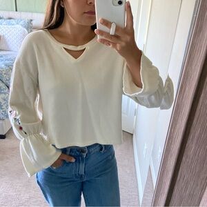 Cream top with embroidered sleeves